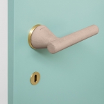 Juno Architecture Door Handle of Cement Color Blush on Rosette by Mandelli Design